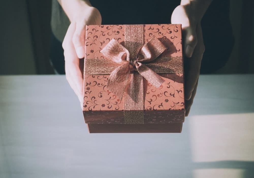 What is the income tax treatment of gift cards and products provided astrade rebates or promotions?